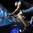 <p>If you get bored during normal spin classes, you'll love the immersive trend. Studios are popping up all over the world - there's Les Mills' <a rel="nofollow noopener" href="https://www.lesmills.com/us/immersive-fitness/" target="_blank" data-ylk="slk:The Trip;elm:context_link;itc:0;sec:content-canvas" class="link ">The Trip</a>, which has locations across the U.S., Europe, and Asia, as well as New York City's <a rel="nofollow noopener" href="https://www.tmplgym.com/" target="_blank" data-ylk="slk:TMPL;elm:context_link;itc:0;sec:content-canvas" class="link ">TMPL</a> and Equinox's <a rel="nofollow noopener" href="https://www.equinox.com/thepursuitbyequinox" target="_blank" data-ylk="slk:The Pursuit;elm:context_link;itc:0;sec:content-canvas" class="link ">The Pursuit</a>. They all involve pedaling in front of a massive screen to help you feel as though you've been transported somewhere <em>other</em> than a gym. </p>