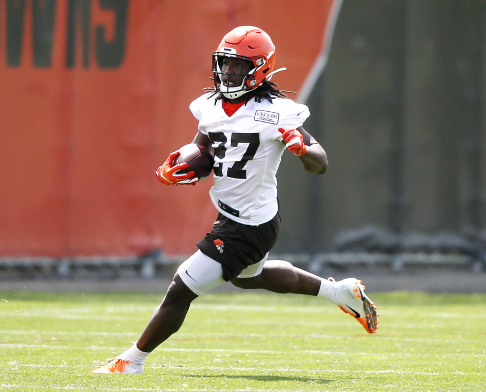 Kareem Hunt was signed by the Cleveland Browns after the Chiefs cut him due to a video of Hunt shoving and kicking a woman. (AP)