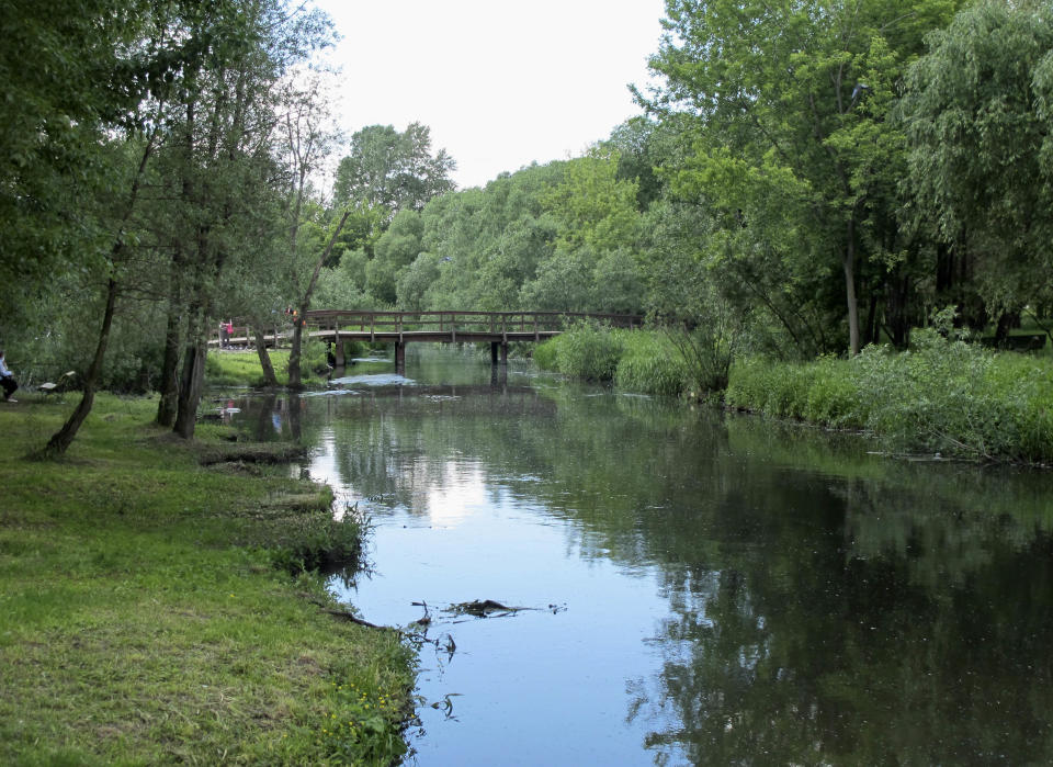 This June 4, 2012 photo shows the Yauza River as it winds its way through the northern part of Moscow. This stretch of the river is an oddly pastoral interlude in the crowded and clamoring Russian capital, with picturesque wetlands and active bird life. (AP Photo/Jim Heintz).