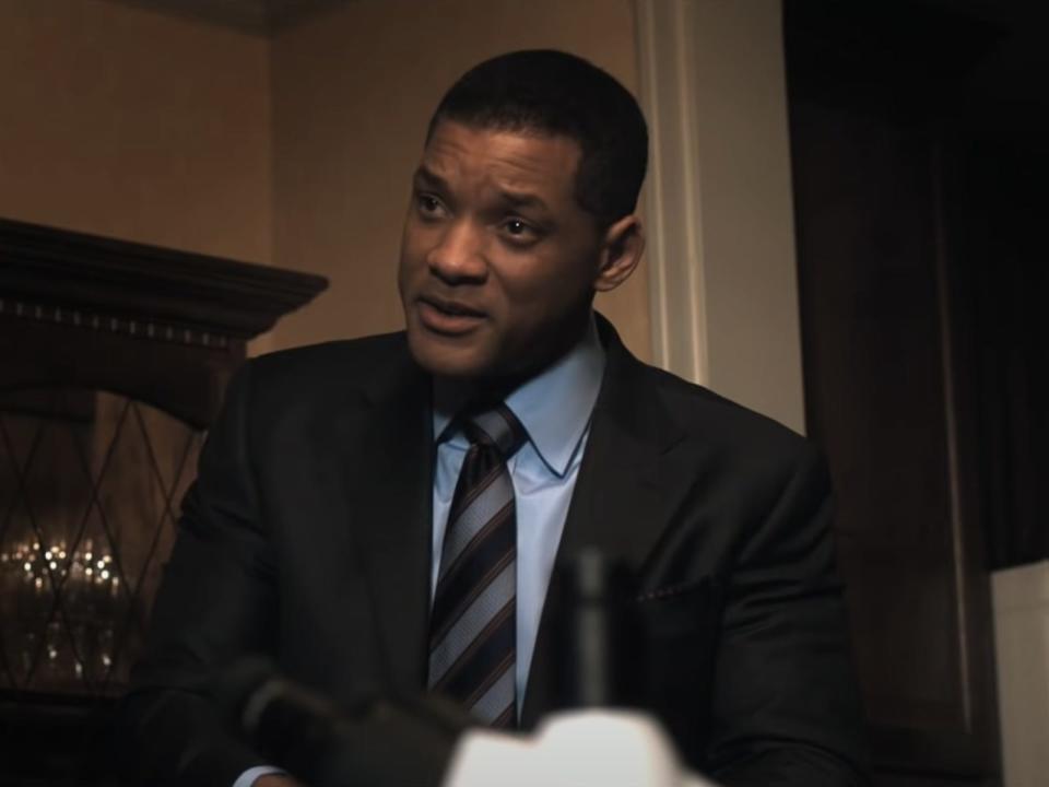 Will Smith wearing a suit in "Concussion" (2015)