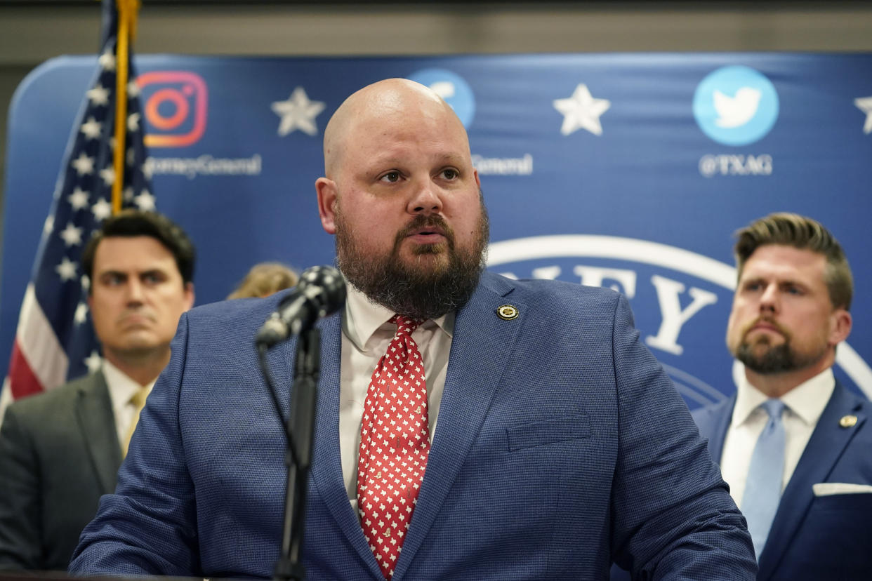 Assistant Texas state Attorney General Christopher Hilton makes a statement at his office in Austin, Texas, Friday, May 26, 2023. An investigating committee says the Texas House of Representatives will vote Saturday on whether to impeach state Attorney General Ken Paxton. (AP Photo/Eric Gay)