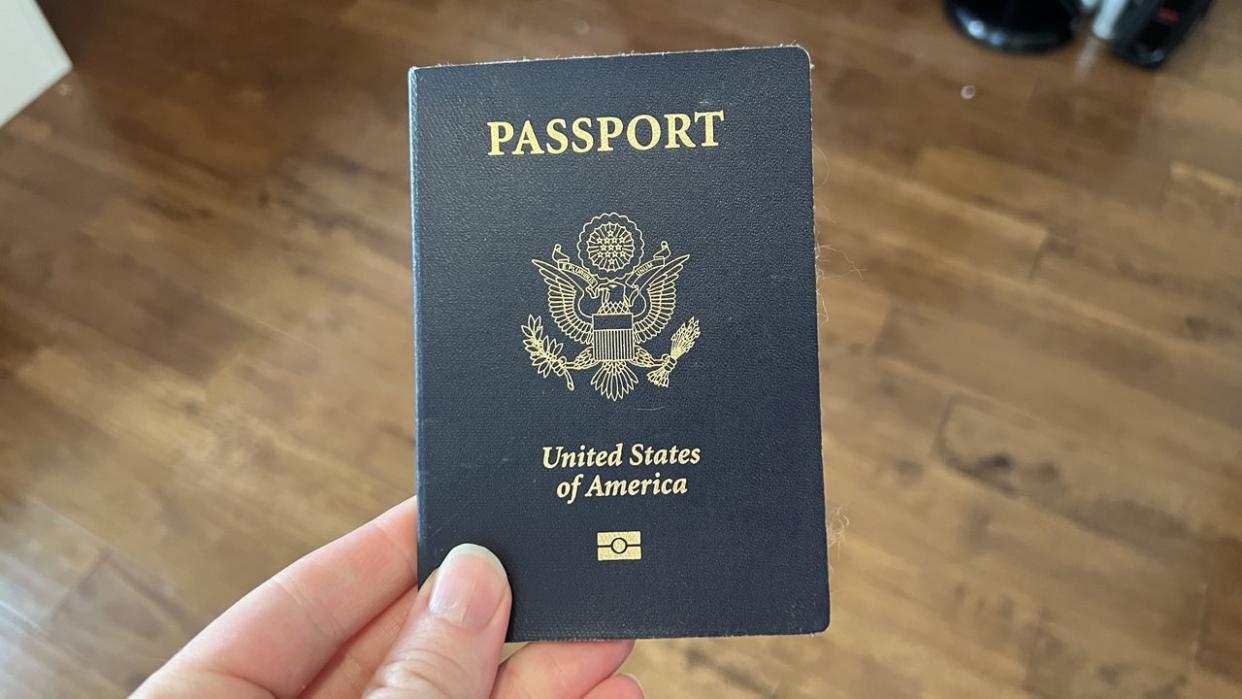 <div>Person holding a United States passport with Department of State logo visible, Lafayette, California, May 23, 2023. (Photo by Smith Collection/Gado/Getty Images)</div>