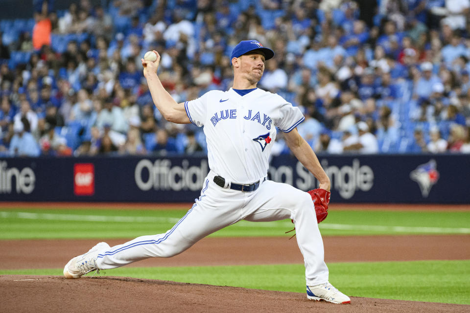 Toronto Blue Jays starting pitcher Chris Bassitt works against the Cleveland Guardians during the first inning of a baseball game Friday, Aug. 25, 2023, in Toronto. (Christopher Katsarov/The Canadian Press via AP)