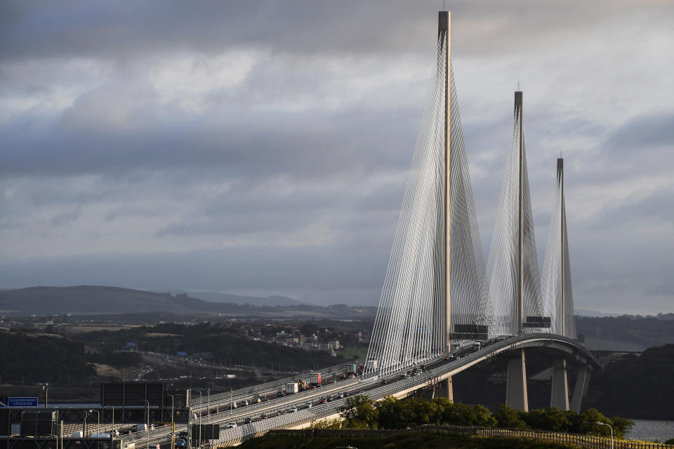 Morning traffic crosses the new Queensferry Crossing as it opens to traffic on August 30, 2017 in South Queensferry, Scotland. Scotland's newest road bridge which began construction in 2011, crosses the Firth of Forth near Edinburgh. The crossing is the world's longest three tower cable stayed bridge.  (Photo by Jeff J Mitchell/Getty Images)