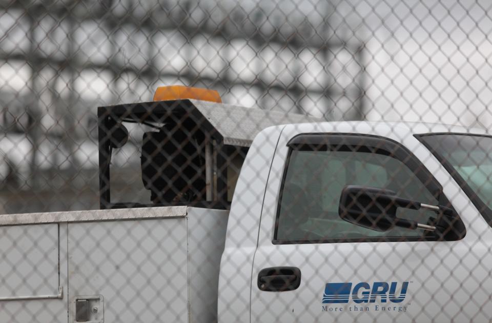 A Gainesville Regional Utilities service truck parked downtown.