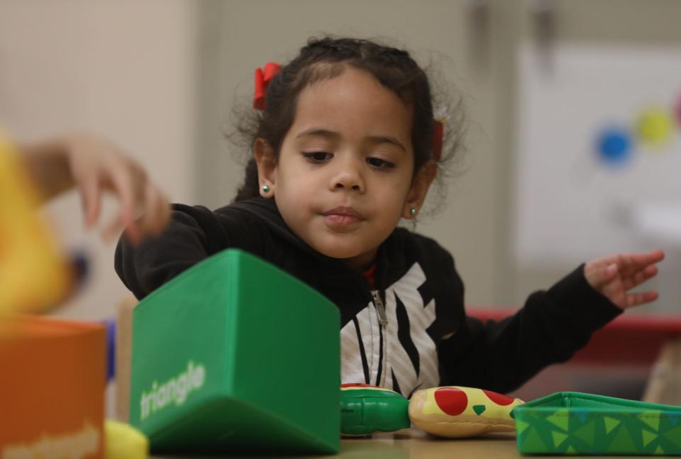 Ashely Martinez works on shapes in her preschool class at School 9.