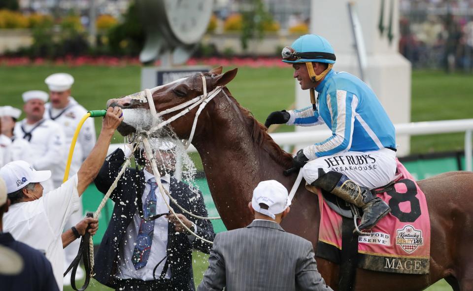 Mage got a cool down with a spray of water in the winner's circle after jockey Javier Castellano rode him to win the Kentucky Derby at Churchill Downs in Louisville, Ky. on May 6, 2023.