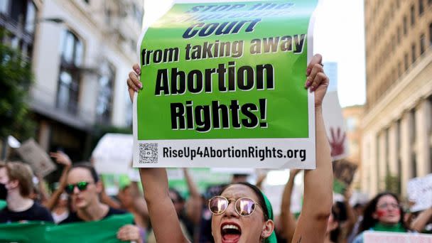 PHOTO: Abortion rights supporters march while protesting against the recent Supreme Court decision to end federal abortion rights protections, June 27, 2022, in Los Angeles. (Mario Tama/Getty Images)