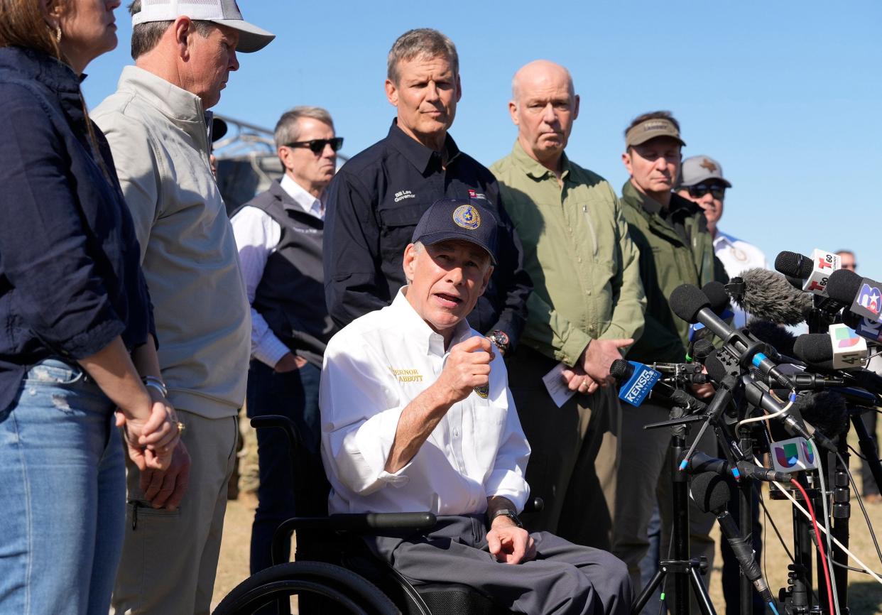 Gov. Greg Abbott, flanked by governors from other states, speaks at a press conference about border policies at Shelby Park in Eagle Pass on Feb. 4.