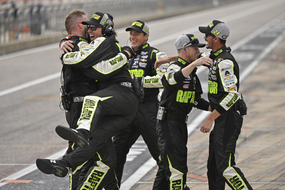 Members of William Byron’s crew celebrate his win after a NASCAR Cup Series auto race on Sunday, March 24, 2024, at Circuit of the Americas in Austin, Texas. (AP Photo/Darren Abate)