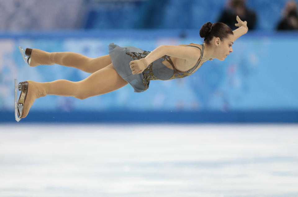 Adelina Sotnikova of Russia competes in the women's free skate figure skating finals at the Iceberg Skating Palace during the 2014 Winter Olympics, Thursday, Feb. 20, 2014, in Sochi, Russia. (AP Photo/Ivan Sekretarev)