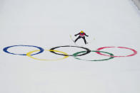 Jarl Magnus Riiber, of Norway, soars through the air during the competition round of the individual Gundersen large hill/10km ski jumping competition at the 2022 Winter Olympics, Tuesday, Feb. 15, 2022, in Zhangjiakou, China. (AP Photo/Matthias Schrader)