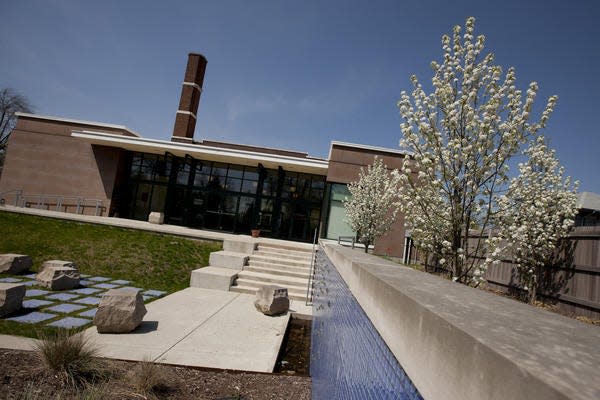 The IU-South Bend Civil Rights Heritage Center is seen on Tuesday in South Bend. The former Natatorium swimming pool, pictured in foreground, is now a garden area.
