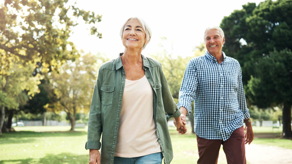 Shot of a happy senior couple going for a walk in the park.