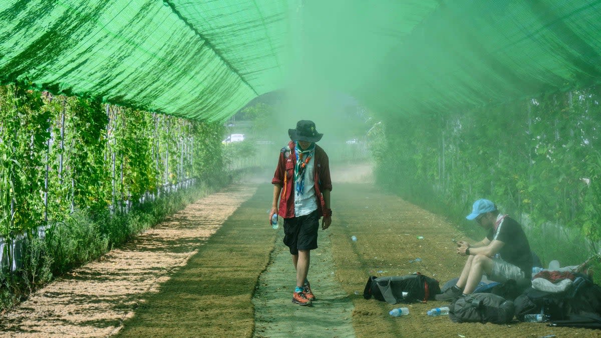 Attendees were forced to find ways to cool off at the site  in Buan, North Jeolla province (AFP via Getty Images)