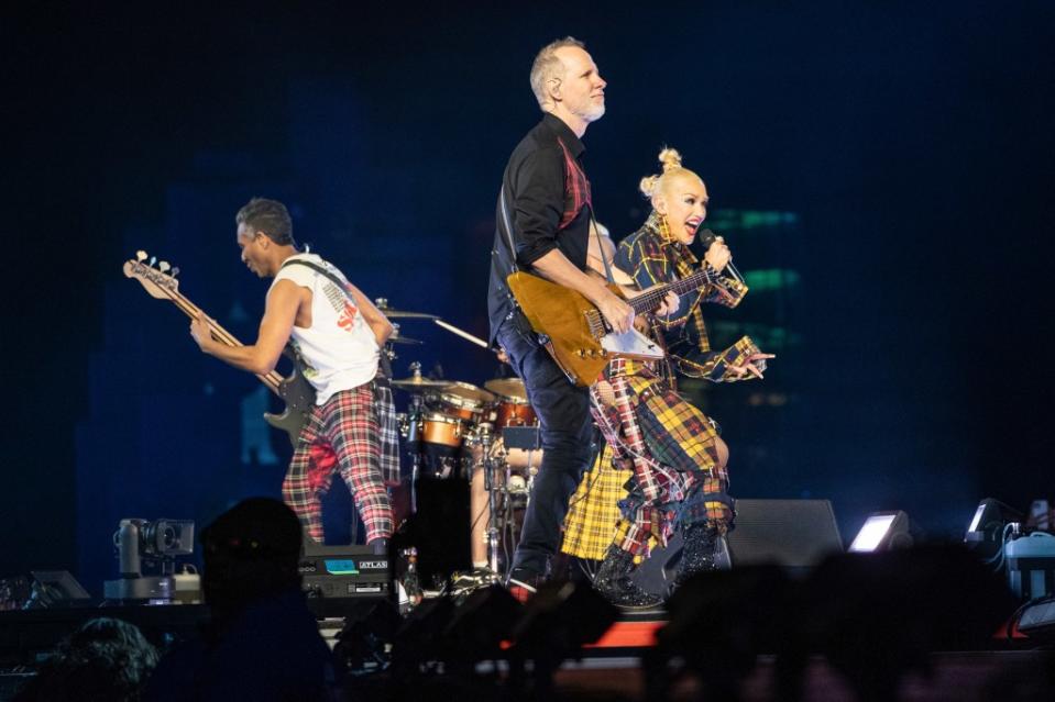 During the performance Stefani, 54, donned one of her iconic plaid outfits, complete with zippers, fishnets and her signature red lipstick. Amy Harris/Invision/AP