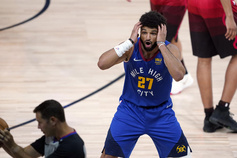 Denver Nuggets' Jamal Murray (27) reacts to a call in Sunday's game against the Jazz. (AP Photo/Ashley Landis, Pool)