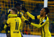 Football Soccer - Borussia Dortmund v Borussia Moenchengladbach - German Bundesliga - Signal Iduna Park, Dortmund, Germany - 3/12/16 - Borussia Dortmund's Ousmane Dembele celebrates with his teammates Marco Reus and Pierre-Emerick Aubameyang after scoring a goal. REUTERS/Thilo Schmuelgen