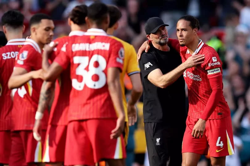 Virgil van Dijk and Jurgen Klopp embrace after Liverpool's win over Wolves, Klopp's last game in charge of the club