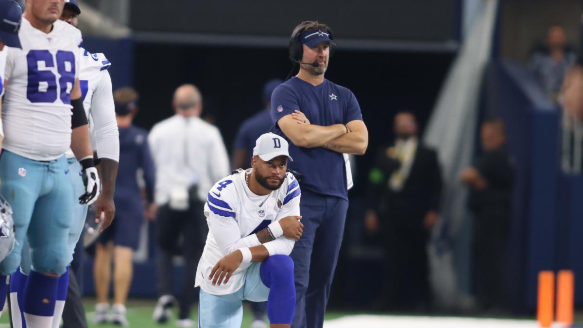 Dallas Cowboys quarterback Dak Prescott (4) in the huddle while on offense  during an NFL game against the Green Bay Packers Sunday, Nov. 13, 2022, in  Green Bay, Wis. (AP Photo/Jeffrey Phelps