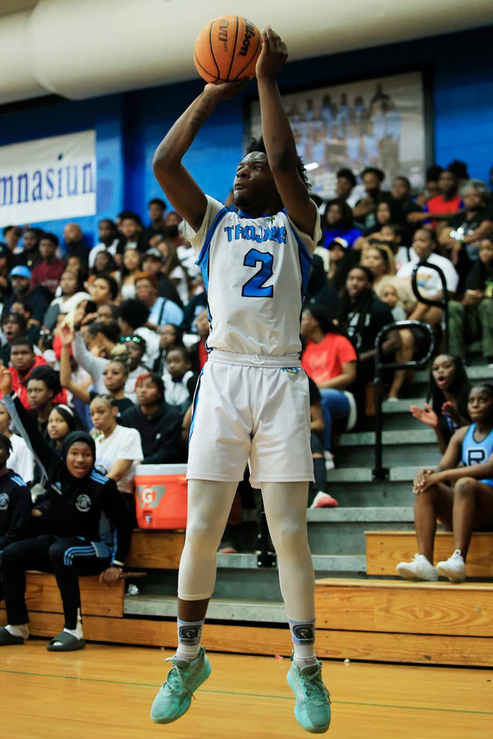 Ribault's George Woods (2) shoots the ball during the fourth quarter of the Class 4A regional basketball final against Bishop Kenny.