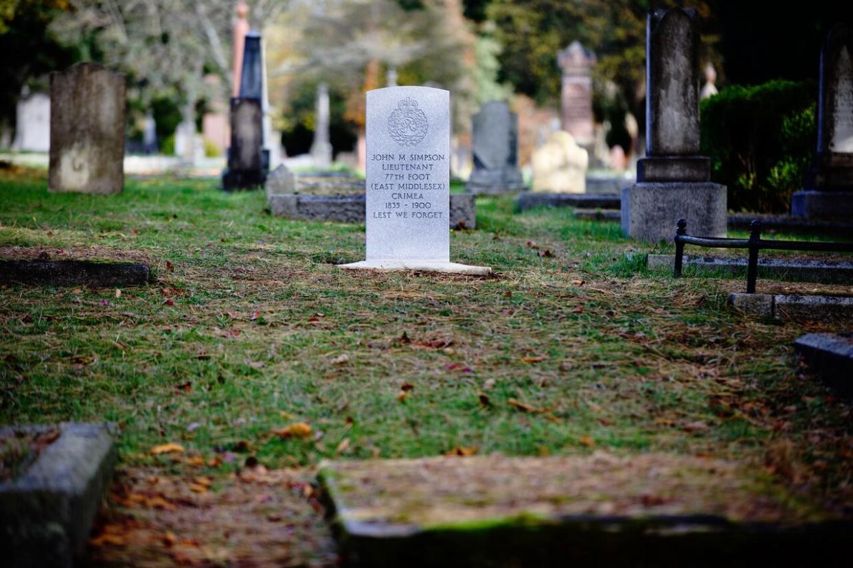 Kyle Scott works with the Last Post Fund, which gives dignified burials and tombstones to fallen soldiers, to identify unmarked graves and install headstones for those who couldn’t afford them at the time. (MIke McArthur/CBC - image credit)