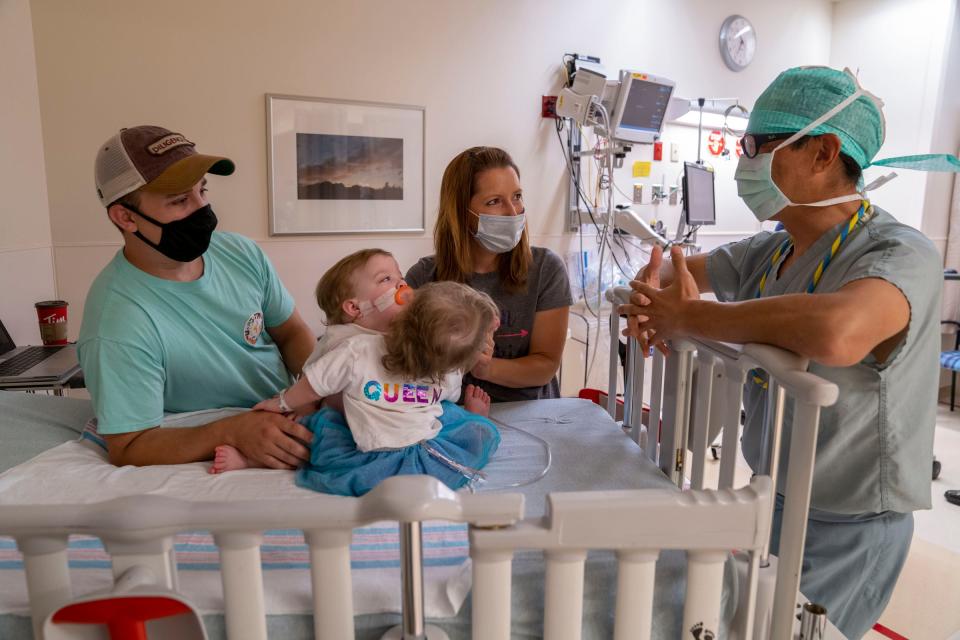 Dr. Richard Ohye, M.D., lead cardiac surgeon, talks to Phil and Alyson Irwin on the morning of surgery.