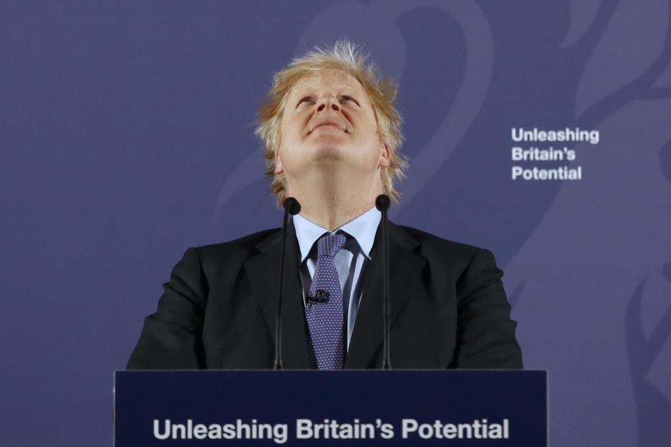 British Prime Minister Boris Johnson outlines his government's negotiating stance with the European Union after Brexit, during a key speech at the Old Naval College in Greenwich, London, Monday, Feb. 3, 2020. (AP Photo/Frank Augstein, Pool)