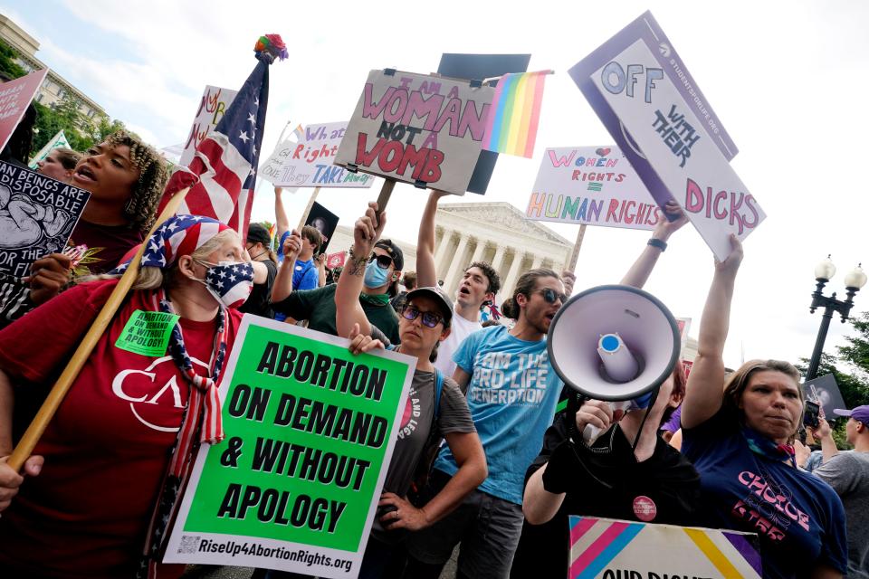 People protest about abortion outside the U.S. Supreme Court in Washington on June 24, 2022, after the high court ended constitutional protections for abortion that had been in place for nearly 50 years.