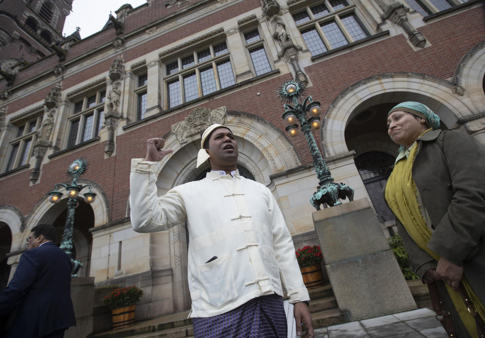 Tun Khin, President of the Burmese Rohingya Organisation UK, reacts outside the International Court in The Hague, Netherlands, Thursday, Jan. 23, 2020, after the court ordered Myanmar take all measures in its power to prevent genocide against the Rohingya. The United Nations' top cour issued a decision on a request by Gambia. (AP Photo/Peter Dejong)