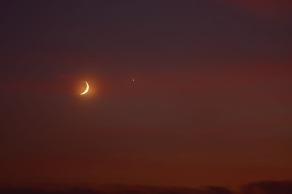 Ben Nevills captured this photo of the moon and Venus over Worthington, Indiana. He took the image with a Canon 40D and Canon 100-400 mm lens on Sept. 8. “The weather was very humid and a slight layer of clouds didn’t make for a very clear pic