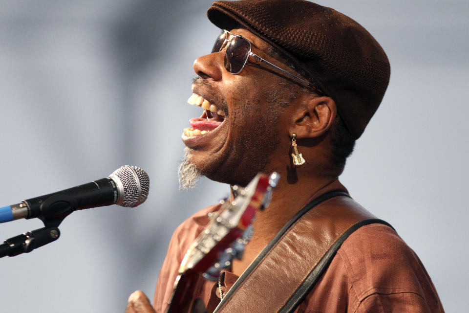 FILE - Blues guitarist and singer Walter 'Wolfman' Washington performs with the Joe Krown Trio at the Louisiana Jazz and Heritage Festival in New Orleans, on April 29, 2011. New Orleans music legend Walter “Wolfman” Washington, a cornerstone of the city's musical nightlife for decades, has died of cancer, just days after turning 79. Washington died on Dec. 22, 2022, at Passages Hospice, The Times-Picayune/The New Orleans Advocate reported. (AP Photo/Gerald Herbert, File)