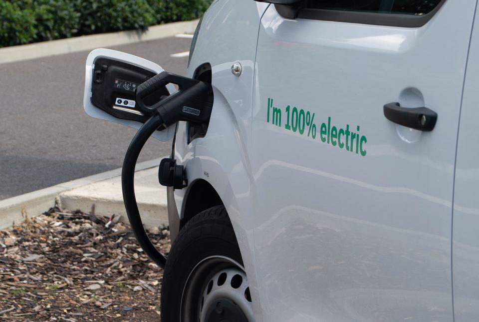 Slough, Berkshire, UK. 15th August, 2023. An openreach 100% electric vehicle on charge at electric vehicle rapid charging points next to the Greggs Drive Thru in Slough, Berkshire. Credit: Maureen McLean/Alamy Live News