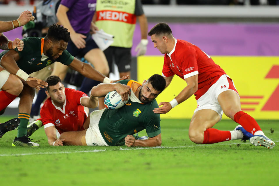 Damian de Allende of South Africa goes over to score his team's first try. (Credit: Getty Images)