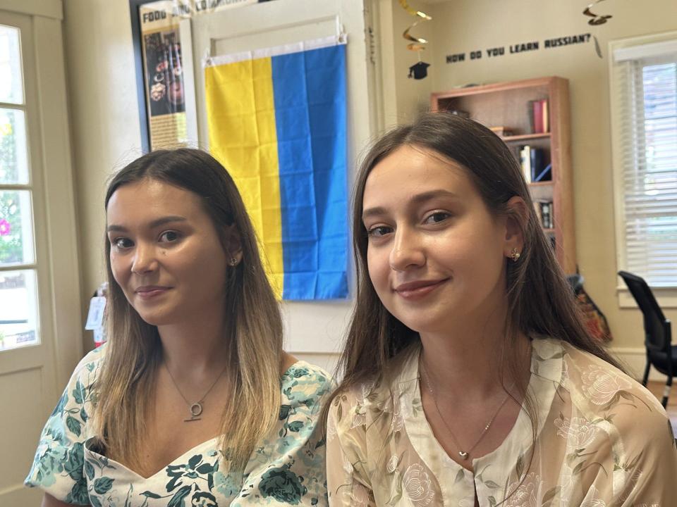 Yana Verbova, left, and Yuliia Balan discuss their time at Stetson University inside the university's Program for Russian, East European and Eurasian Studies building. Both are from Ukraine and graduate on Saturday.