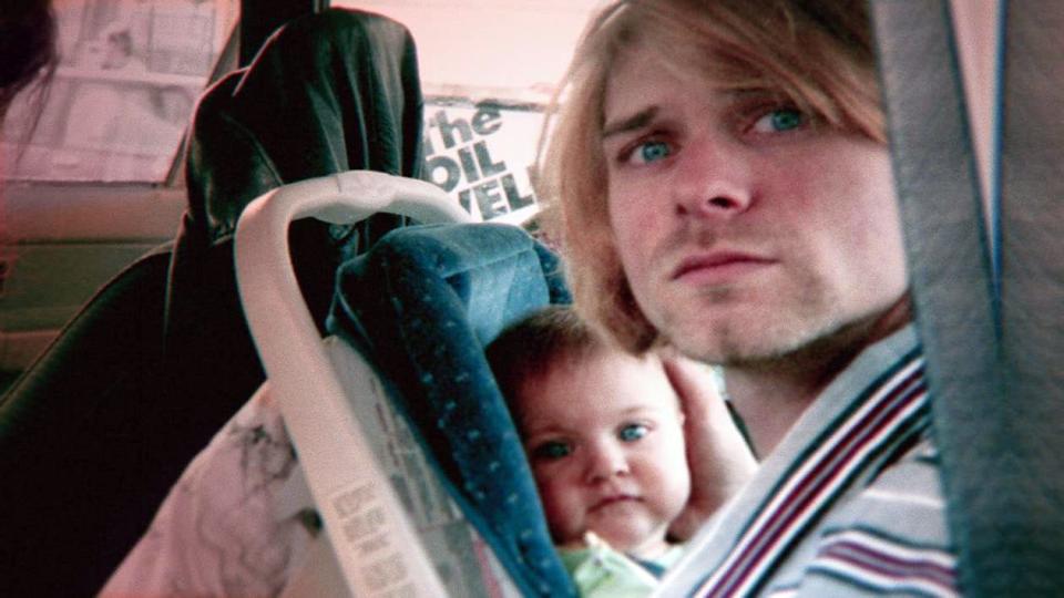 Kurt Cobain with daughter Frances Bean Cobain in a photo from the documentary motion picture "Kurt Cobain: Montage of Heck."