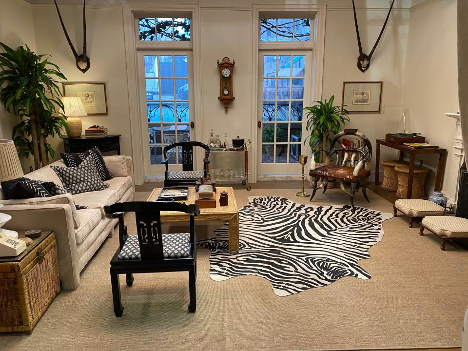 “The horn chair in the penthouse living room was difficult to find and costs a fortune. It would probably run $6,000 by now. One-of-a-kind pieces are quite a challenge, so we used a cowhide rug instead of a zebra,” says Hale.