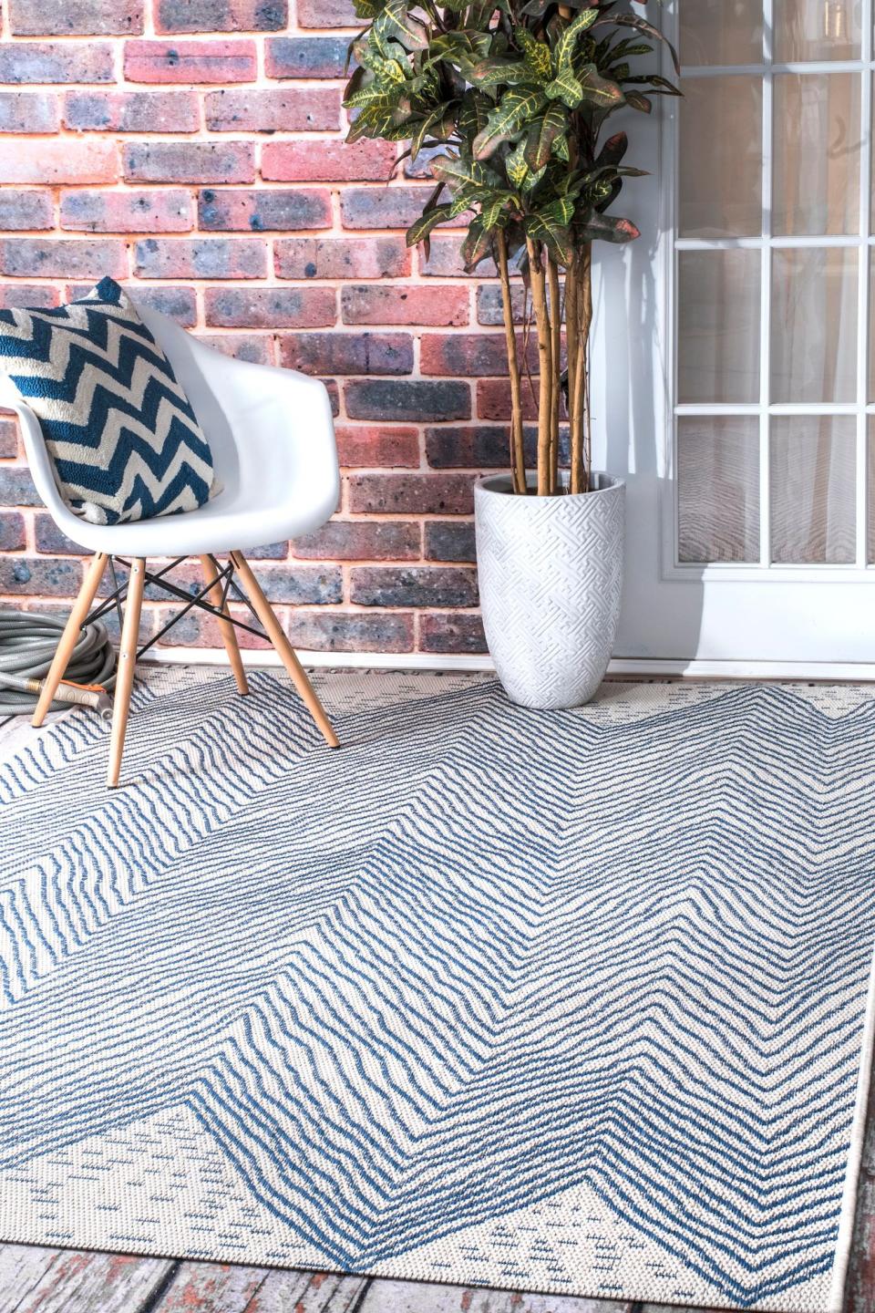 <p><a href="https://go.redirectingat.com?id=74968X1596630&url=https%3A%2F%2Fwww.rugsusa.com%2Frugsusa%2Frugs%2Frugs-usa-wavy-chevron-outdoor%2FBlue%2F200OWDN22A-P.html&sref=https%3A%2F%2Fwww.housebeautiful.com%2Fshopping%2Fhome-accessories%2Fg21756890%2Fbest-outdoor-rugs%2F" rel="nofollow noopener" target="_blank" data-ylk="slk:Shop Now;elm:context_link;itc:0;sec:content-canvas" class="link ">Shop Now</a></p><p>Wavy Blue Chevron Indoor/Outdoor Rug</p><p>rugsusa.com</p><p>$176.95</p>