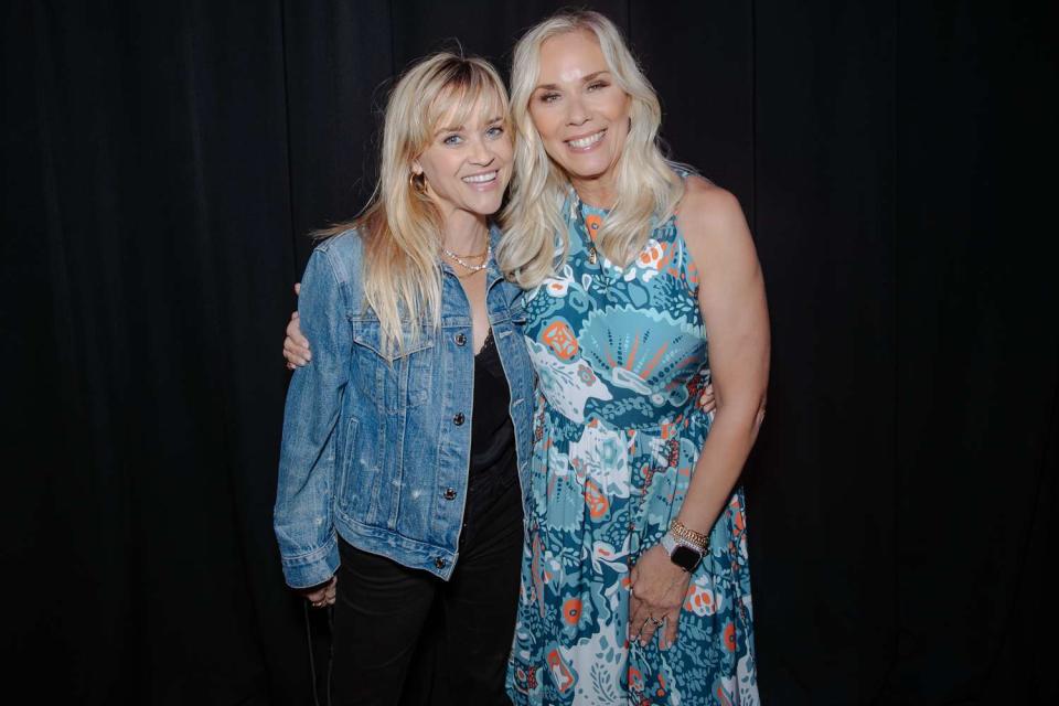 <p>Catherine Powell</p> Reese Witherspoon with Leanne Morgan in Nashville, Tenn., at the Ryman Auditorium in August 2023.