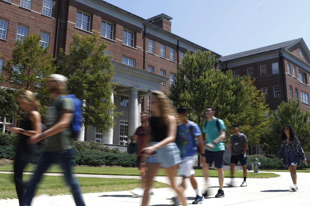 Students walk on campus at the University of Georgia (Joshua L. Jones / Athens Banner-Herald via AP)