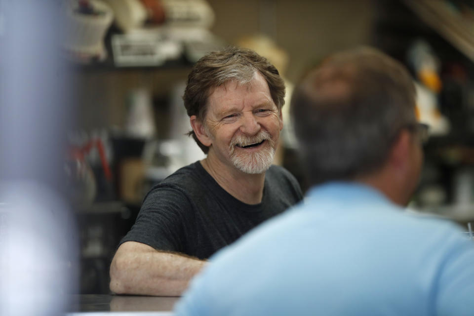 FILE - Baker Jack Phillips, owner of Masterpiece Cakeshop in Lakewood, Colo., manages his shop, June 4, 2018, after the U.S. Supreme Court ruled that his refusal to make a wedding cake for a same-sex couple because of his religious beliefs did not violate Colorado's anti-discrimination law. The Colorado Supreme Court will hear arguments Tuesday, June 18, 2024, in a lawsuit against Phillips, the Christian baker who refused to make a cake celebrating a gender transition, one of three such cases from the state that have involved LGBTQ+ civil rights and First Amendment rights. Two cases have centered Phillips. (AP Photo/David Zalubowski, File)