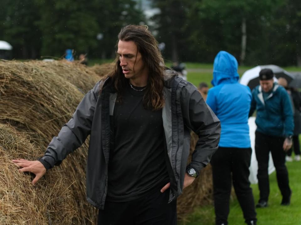 Former NFLer Luke Willson, seen above during an episode of Canada's Ultimate Challenge, is now hoping to reach the 2024 Olympics as a track cyclist. (CBC - image credit)