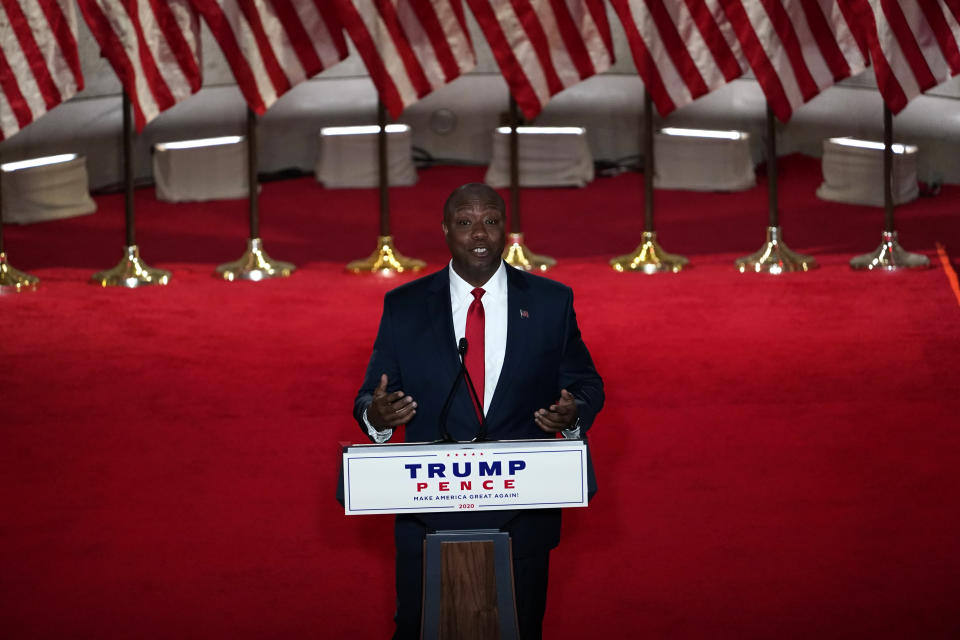 Sen. Tim Scott, R-S.C., speaks during the Republican National Convention from the Andrew W. Mellon Auditorium in Washington, Monday, Aug. 24, 2020. (AP Photo/Susan Walsh)