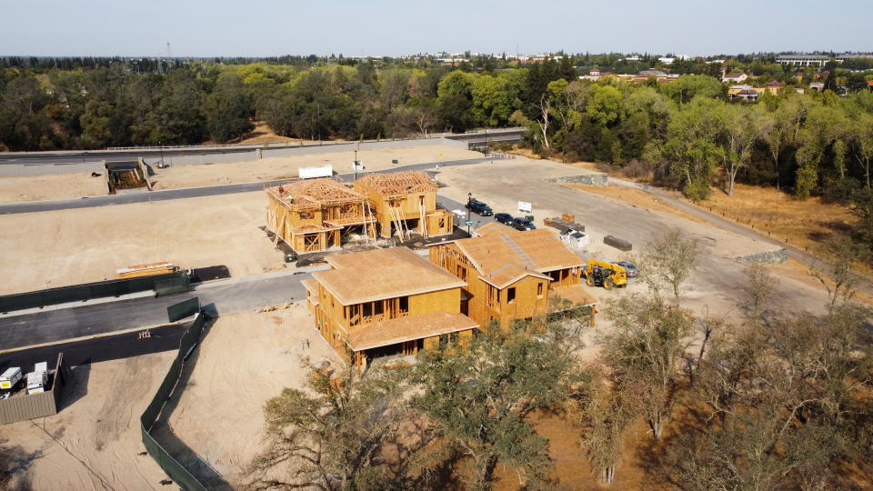 New homes are under construction at a model home display in the Eureka Grove neighborhood of Granite Bay, California, U.S., October 5, 2021. Picture taken with a drone. Picture taken October 5, 2021. REUTERS/Nathan Frandino