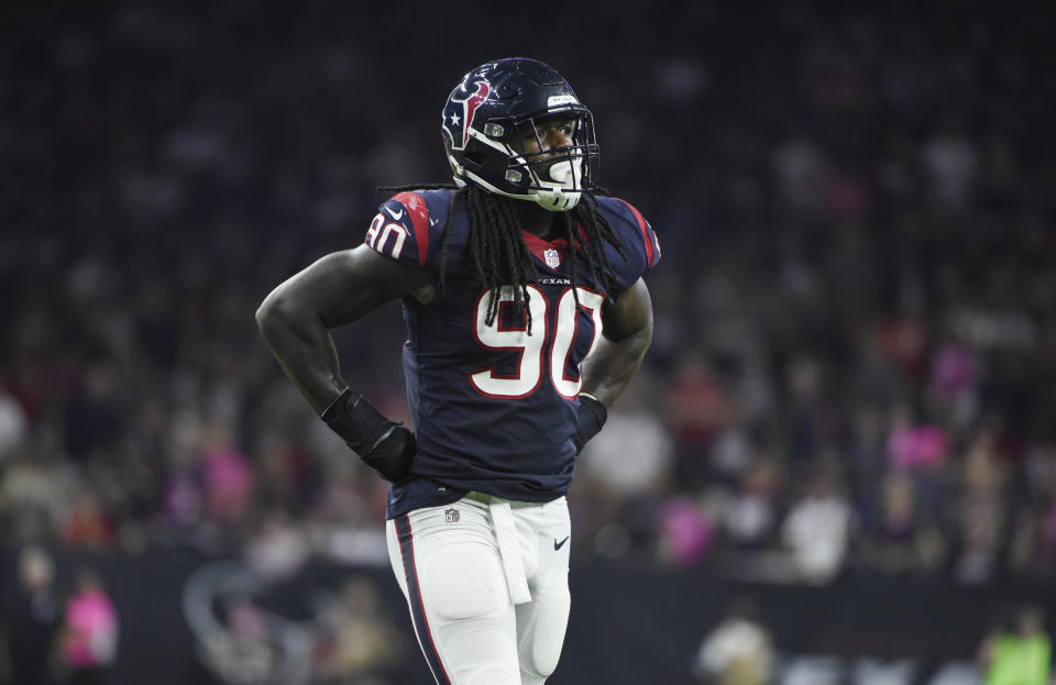 Jadeveon Clowney (90) has not signed his franchise tag with the Texans. (AP)