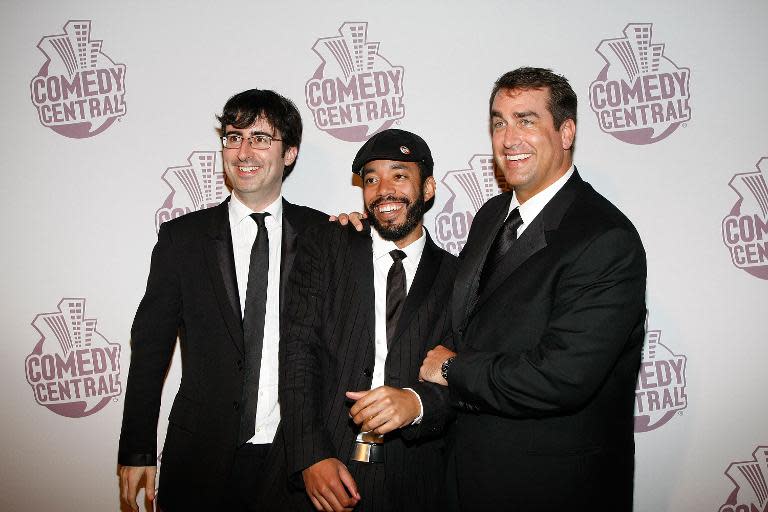 Correspondents for "The Daily Show with Jon Stewart" John Oliver (L), Wyatt Cenac and Rob Riggle, arrive at Comedy Central's Emmy Awards party at the STK restaurant September 21, 2008, in Los Angeles, California