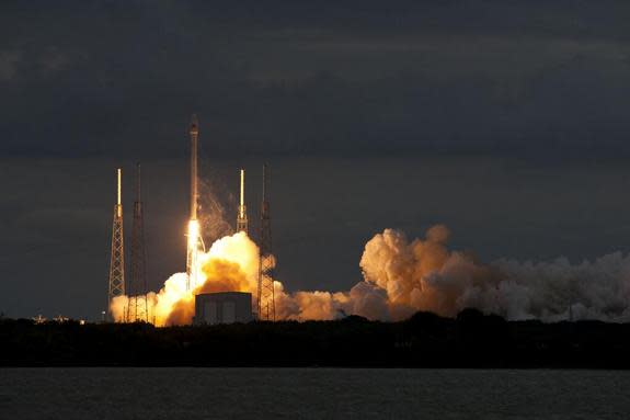 A SpaceX Falcon 9 rocket blasts off from Florida's Cape Canaveral Air Force Station on Jan. 6, 2014, carrying the THAICOM 6 telecommunications satellite to orbit.