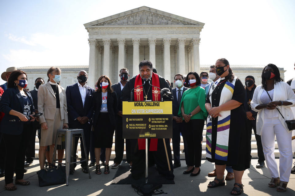 WASHINGTON, DC - AUGUST 12: Rev. William Barber, Co-Chair of the Poor People’s Campaign, speaks alongside Texas State Representatives and fellow religious leaders, as they prepare to deliver a petition to Senate Majority Leader Charles Schumer calling for an end to the filibuster, the passage of the For The People Act and restoring the Voting Rights Act, at the U.S. Supreme Court on August 12, 2021 in Washington, DC. (Photo by Kevin Dietsch/Getty Images)<span class="copyright">Getty Images—2021 Getty Images</span>