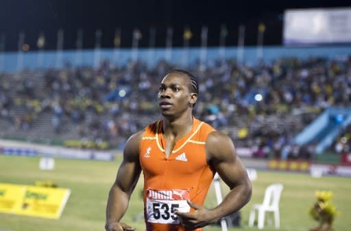 Yohan Blake celebrates after winning the 100m men's final of the Jamaican Olympic Athletic Trials at the National Stadium in Kingston, on June 29. Blake served notice he will be ready to challenge for the Olympic title by upstaging world record holder Usain Bolt to win in 9.75 sec