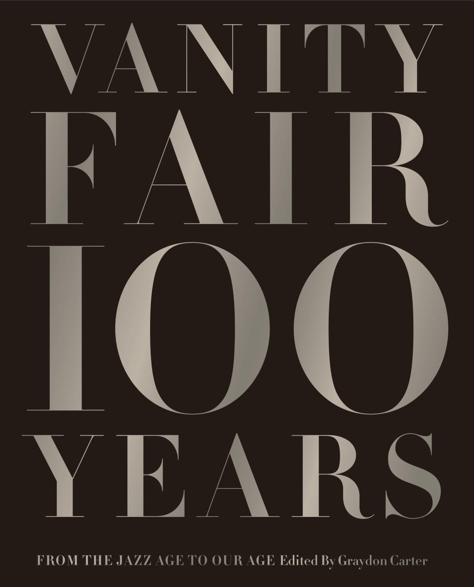 This book cover image released by Abrams Books shows "Vanity Fair 100 Years: From the Jazz Age to Our Age," Edited by Graydon Carter. The holidays bring out the inner-coffee table book obsessive in gift buyers. They're easy, weighty and satisfying to give. (AP Photo/Abrams Books)
